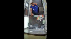 Truck tyre explodes and flies into toll booth covering worker in shattered glass
