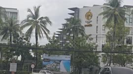 Police search hotel where Thai graduate was 'drugged and murdered by two tourists' during threesome