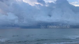 US: Rain storms over the ocean seen from Hollywood Beach