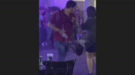 Mexicans shout the cry of independence by dancing drunkenly in the rainwater at the traditional Mexican bar Club Obregon in Hermosillo, Sonora, Mexico.