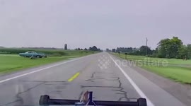 Deer runs into road narrowly missing collision with police car