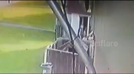 trying to fix a motorbike which ends up wheeling through a fence.