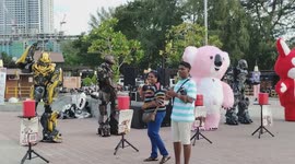 Transformers and Giant Bear Entertain Crowd With Dance Show