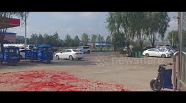 Man in wheelchair pulls tricycle in Heilongjiang, China