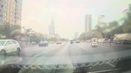 Dashcam captures tricycle accident involving dogs in Henan, China