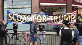 banner held up in central London saying” Scots for trump.