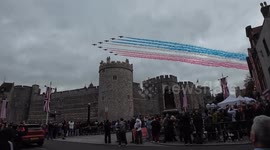 Red Arrows fly past Windsor Caste as Donald Trump state visit takes place