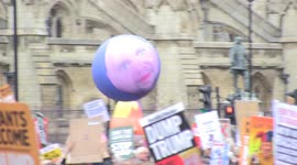 Giant JD Vance meme face bounces around anti-Trump protest rally in London
