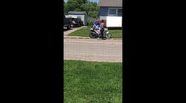 Guy Gets Pushed Off Motorcycle by His Girlfriend