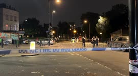 police secure scene of double shooting in Hackney
