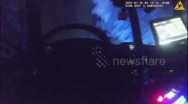 US: Officer Heroically Saves Two People From Burning Car