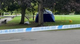 Police cordon at London park after man dies and woman injured in shooting