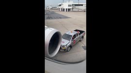 Passengers horrified when ground truck crashes into plane's engine