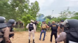 Riot police fire tear gas at Cambodian villagers as clashes continue on border