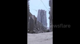 Bombing and destroying the tallest tower in the Gaza Strip