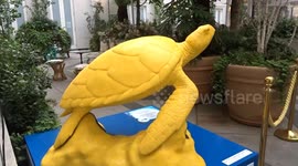 Tusk Turtle Trail 2025 - thought-provoking Beneath the Turtle sculpture by Jacob Vilato stood in Covent Garden
