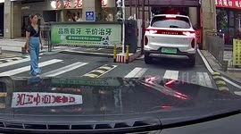 Alert driver sounds horn to warm mum of car reversing into daughter