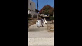Bridesmaid Falls Down Steps, Drags Bride Down With Her
