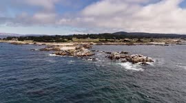 Aerial View Captures the Coastal Charm of Pacific Grove and Its Iconic Point Pinos Lighthouse