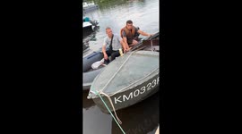 Man falls into lake while transferring between boats in Kimry, Russia