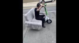 Couple Use Electric Scooter To Transport Couch