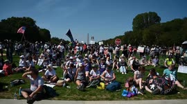 Anti-Trump protesters hold rally in Washington DC