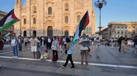 Protest signs at Gaza flashmob in Milan
