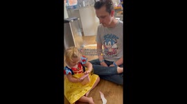 Young girl and her autistic uncle share adorable viral moment opening presents