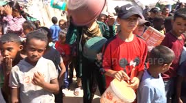 Children scrape pots for food in Gaza amid food blockade