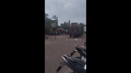 Severe weather sends roof flying and trees swaying in Soreang, Indonesia