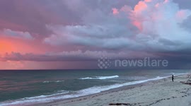Glorious sunrise glows orange and purple over Dania Beach in Florida