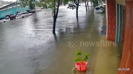 Flood waters break into office after heavy rains in Guangdong, China