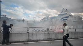 Smoke bombs thrown at police vans during Gaza solidarity protest in Genoa, Italy