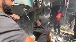 Dozens trapped under rubble after Israeli strike on residential building in Gaza