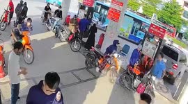 Car crashes into fuel station sparking fire