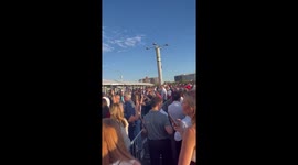 People gather at State Farm Stadium for Charlie Kirk in Glendale, Arizona