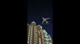 Plane flies at extremely low altitude over rooftops in Novaya Moscow, Russia