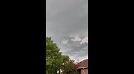 Tornado sirens sound as dark clouds form in Denton, Texas, USA