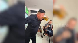 Man drinks pint of beer - through his nose