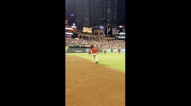 Cardinals Fan Rushes the Field at Busch Stadium