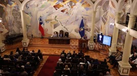 Isabel Allende receives the rector's medal from the University of Chile