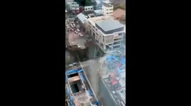 Sinkhole swallows vehicle as road collapses during rush hour in Bangkok