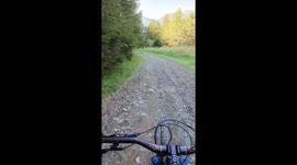 Hiker gets startled by mountain biker on 3-Country Enduro Trail in Nauders, Austria