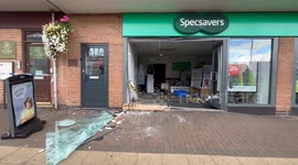 Three hurt after car ploughs into Specsavers