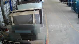 Bungling factory worker drops huge pane of glass in China