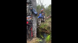 Motorcycle Falls Off Bridge Into Stream