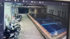Distracted delivery rider falls into pool but keeps order dry