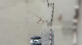 Locals swim in flooded streets as Typhoon Ragasa hits China's Zhuhai