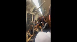 Elderly passenger shouts at woman over youngster being noisy on subway train
