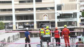 Sandbags used to secure giant sinkhole on Bangkok road